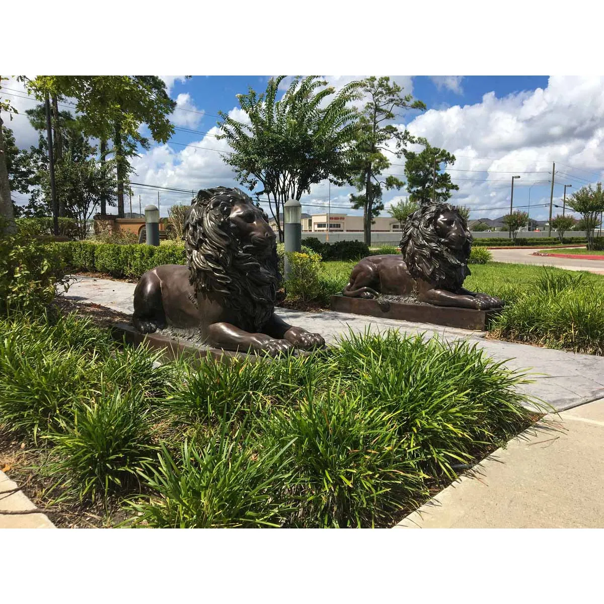 Pair of Reclining Palace Lions